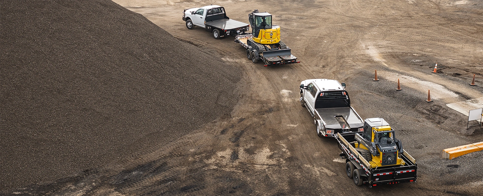 Trailers hauling large equipment.