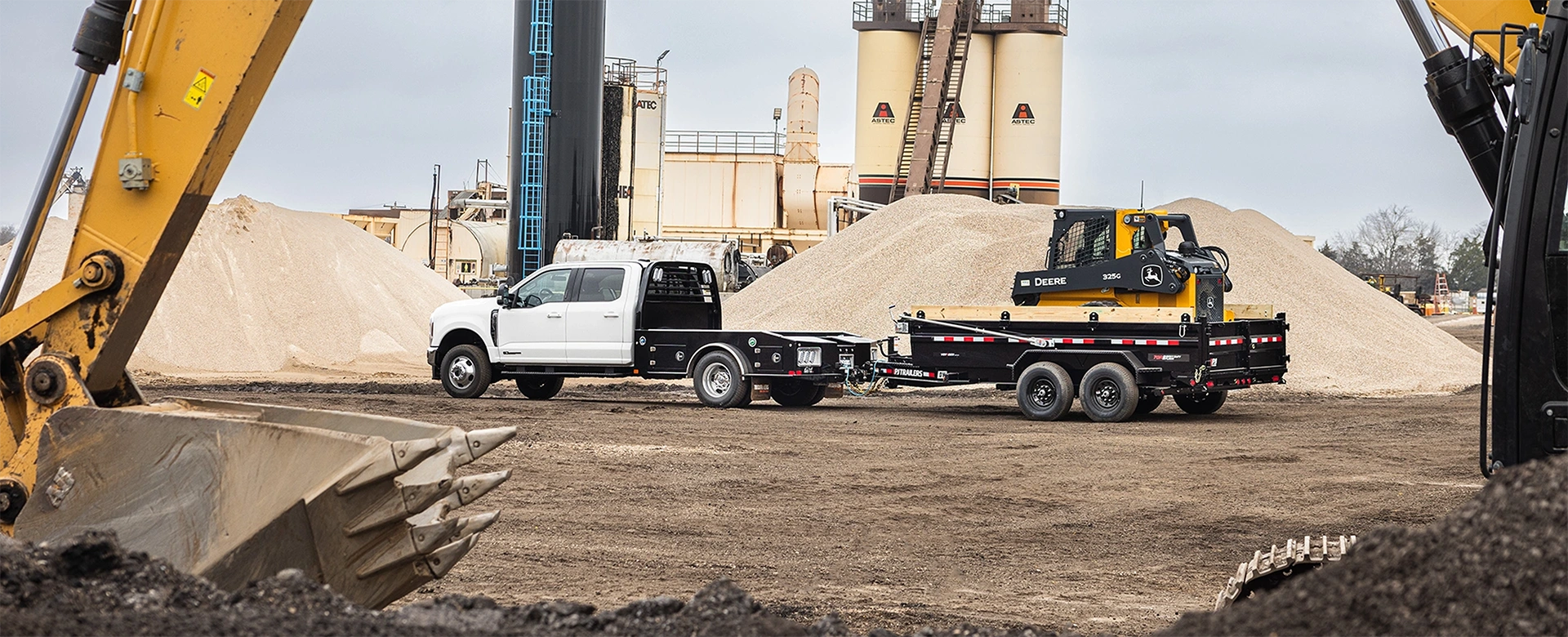 Construction equipment on a PJ Trailer.