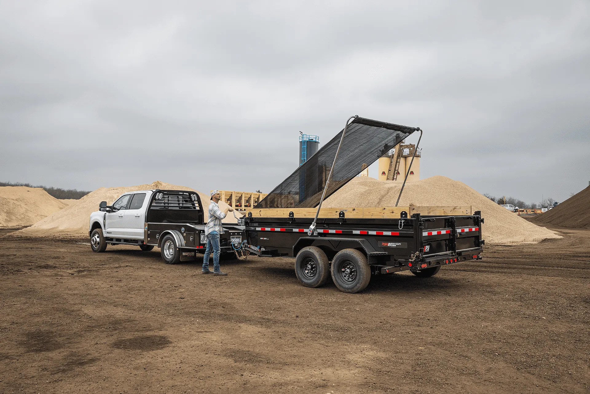 Deckover trailer at construction site.